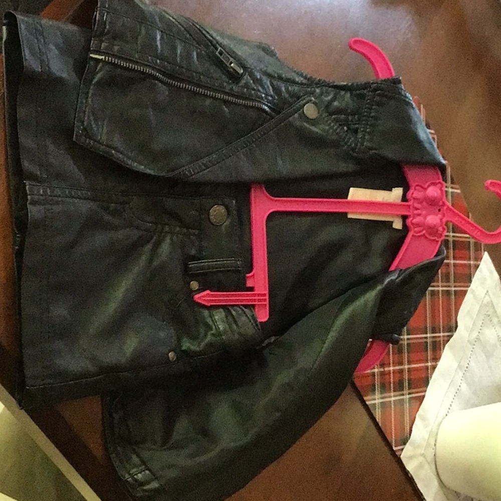 Little girl leather like vest and skirt